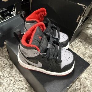 Jordan Kids Black and Gray Sneakers with Red Accents